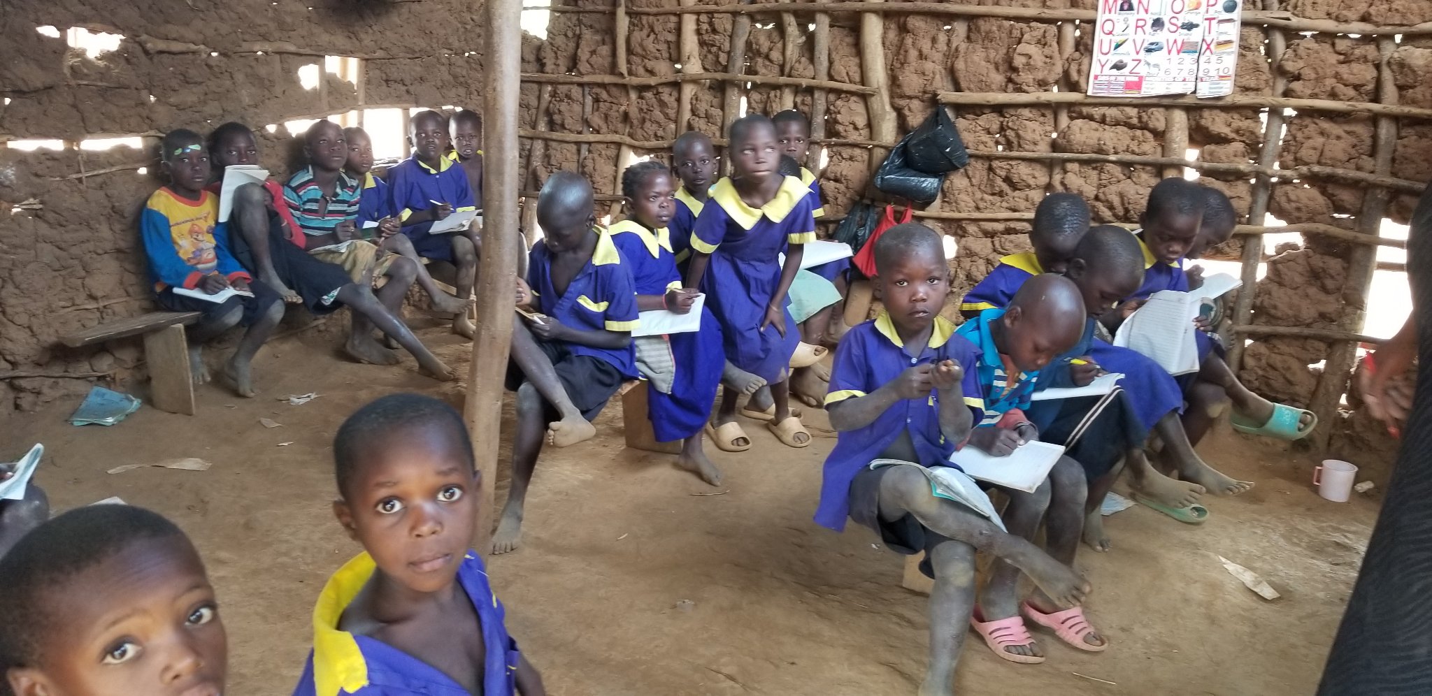 Children sitting on benches